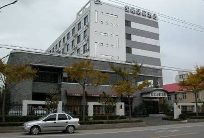 Baolong Homelike Hotel Wu Song